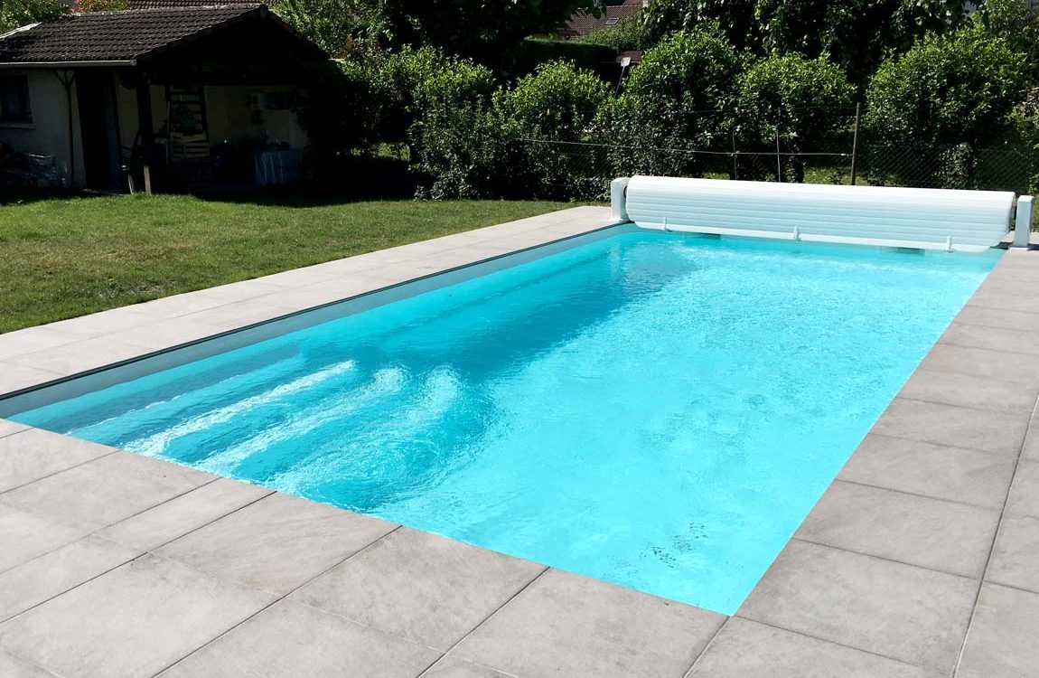 Construction d'une piscine à coque et d'un volet hors sol à Villard Bonnot